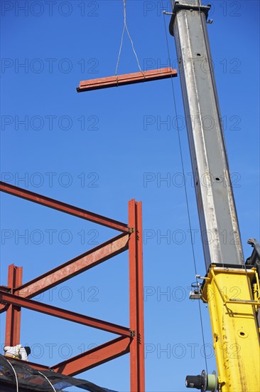 Crane holding steel girder. Date : 2007