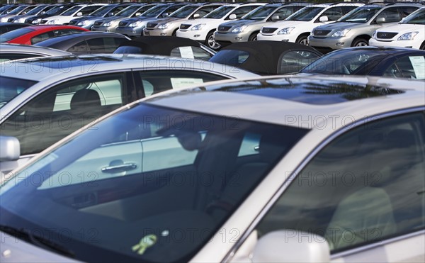 Rows of new cars on lot. Date : 2007