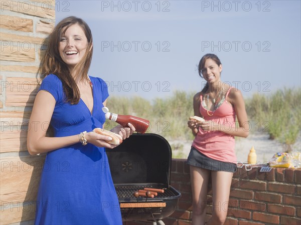 Young women at barbecue. Date : 2007