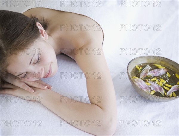 Woman laying on spa table. Date : 2007