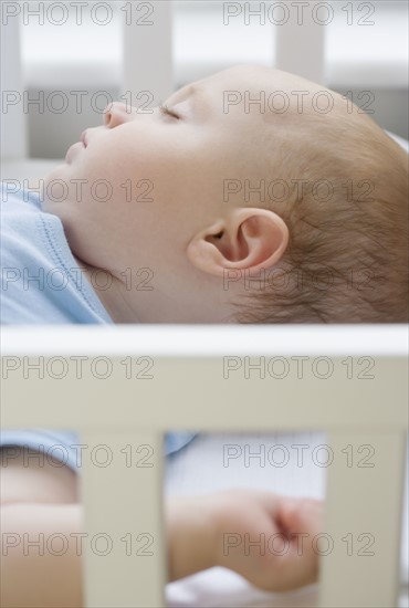 Baby sleeping in crib. Date : 2007