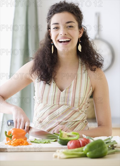 Woman chopping vegetables. Date : 2007