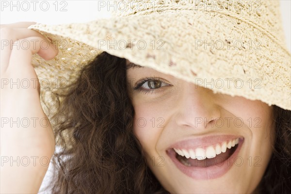 Woman wearing sunhat. Date : 2007