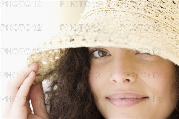 Woman wearing sunhat. Date : 2007