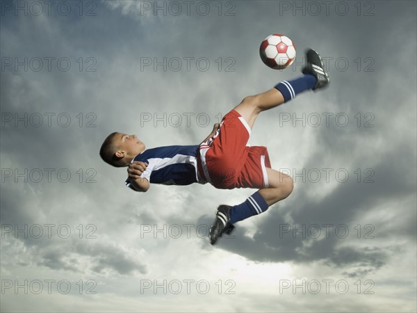 Low angle view of soccer player jumping. Date : 2007