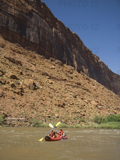 People paddling in raft. Date : 2007