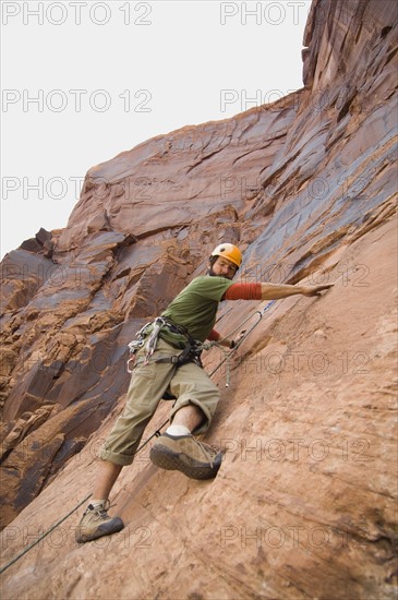 Man rock climbing. Date : 2007