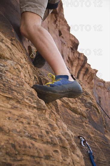 Man rock climbing. Date : 2007