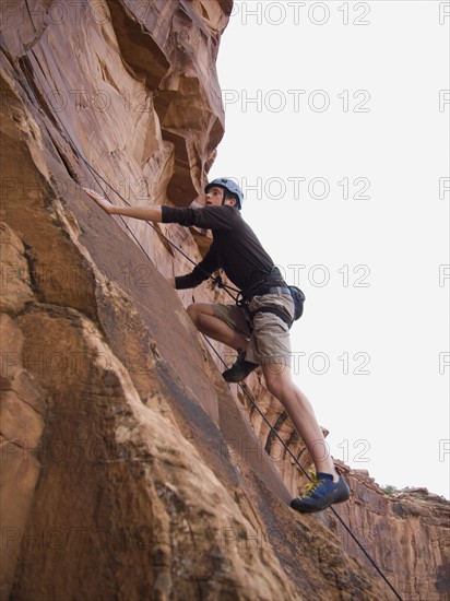 Man rock climbing. Date : 2007