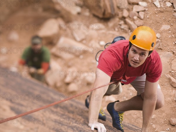 Man rock climbing. Date : 2007