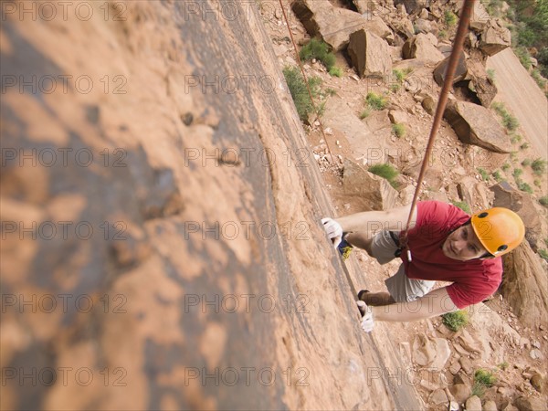 Man rock climbing. Date : 2007