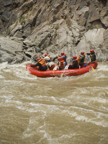 Group of people river rafting. Date : 2007