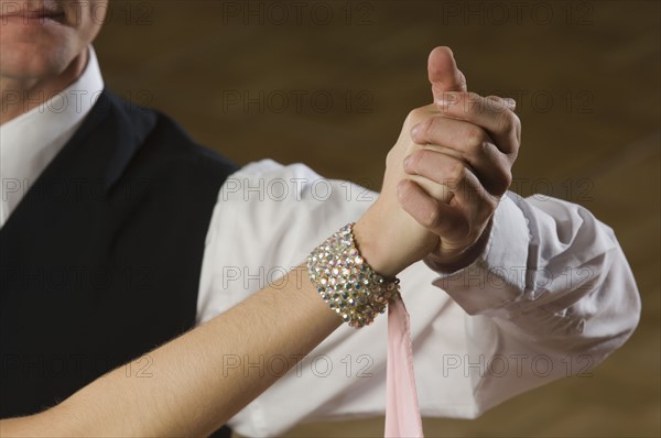 Close up of couple ballroom dancing. Date : 2007