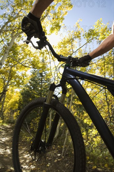 Person riding mountain bike, Utah, United States. Date : 2007