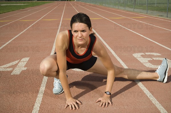 Female runner stretching, Utah, United States. Date : 2007