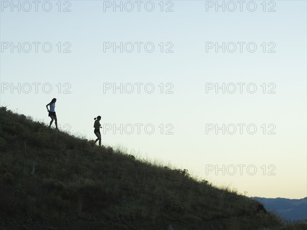 People walking down mountain, Salt Flats, Utah, United States. Date : 2007