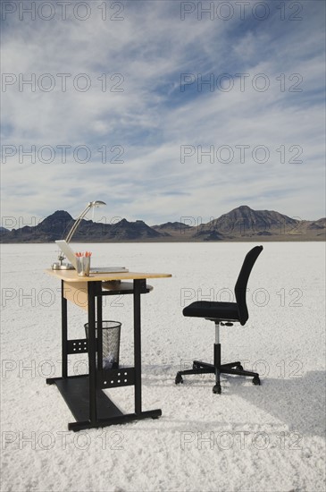 Desk with laptop on salt flats, Salt Flats, Utah, United States. Date : 2007
