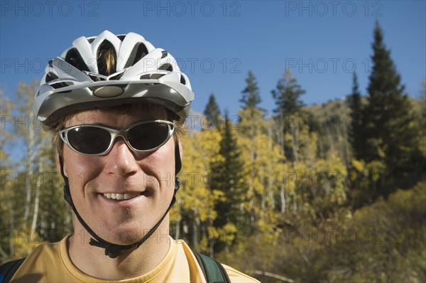 Man wearing bicycle helmet, Utah, United States. Date : 2007