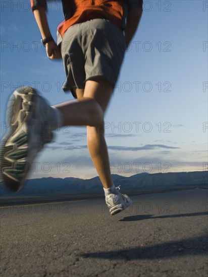 Man in athletic gear running. Date : 2007