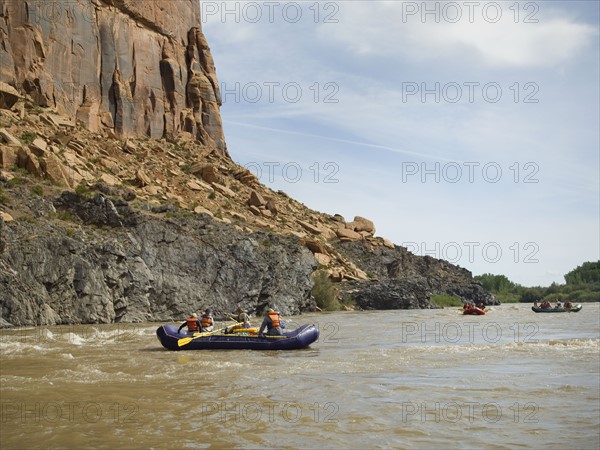 Groups of people river rafting. Date : 2007