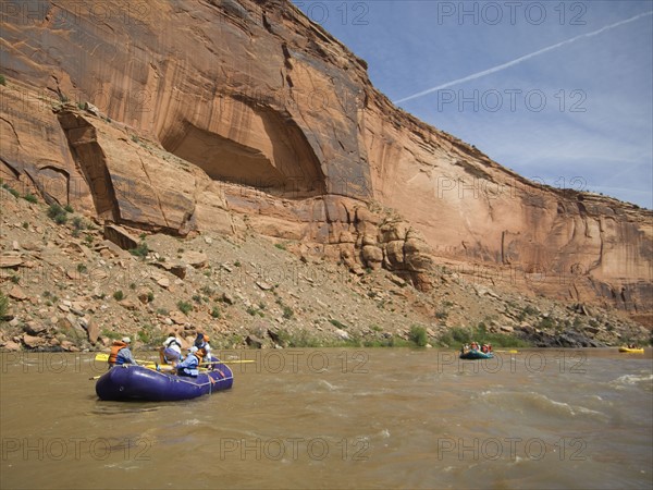 Groups of people river rafting. Date : 2007