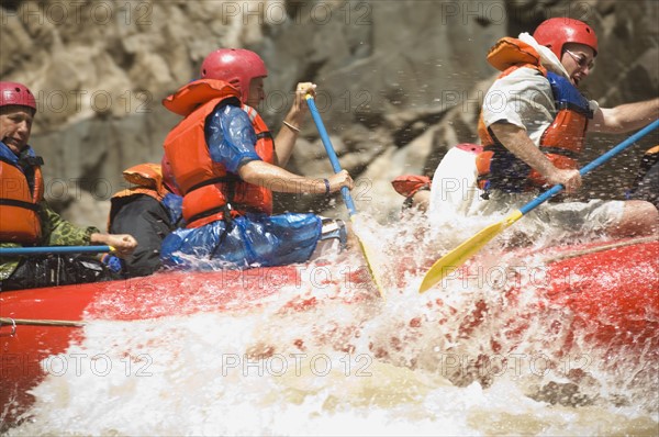 Group of people river rafting. Date : 2007