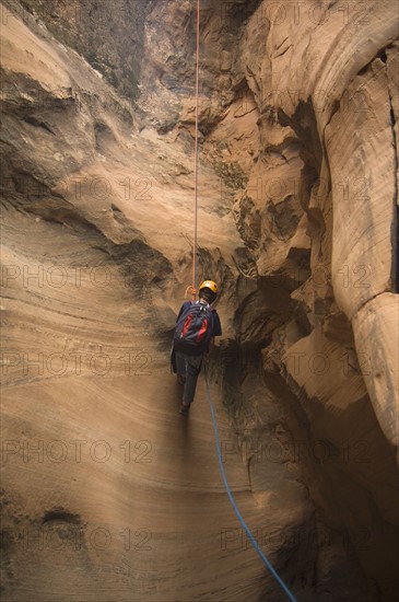 Person canyon rappelling. Date : 2007