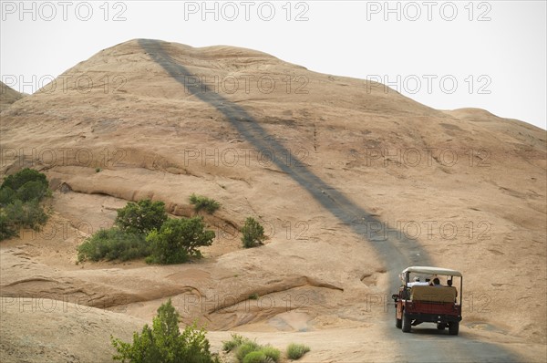 Off-road vehicle driving on rock formation. Date : 2007