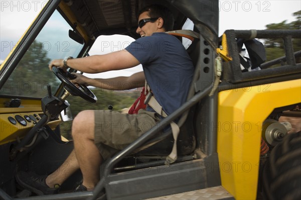 Man driving off-road vehicle. Date : 2007