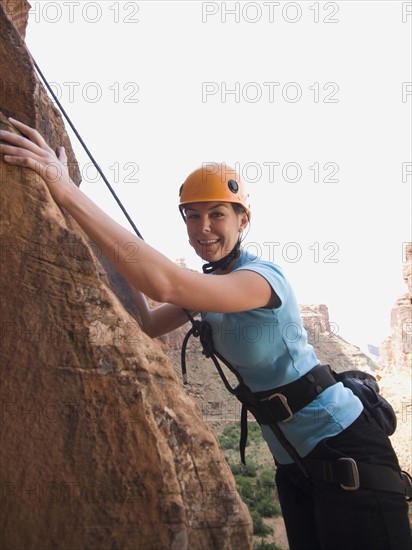 Close up of woman rock climbing. Date : 2007