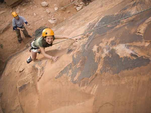 Couple rock climbing. Date : 2007