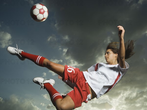 Low angle view of soccer player jumping. Date : 2007