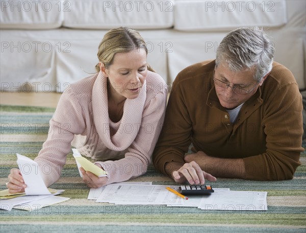 Couple preparing taxes.