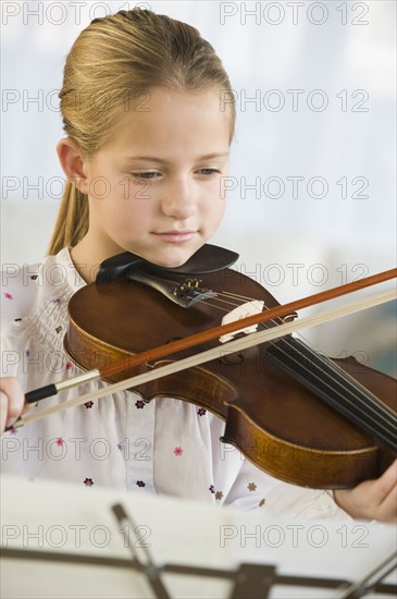 Girl playing violin.