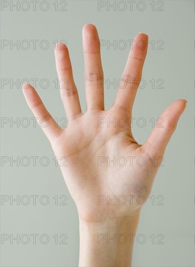 Close up of woman’s hand.