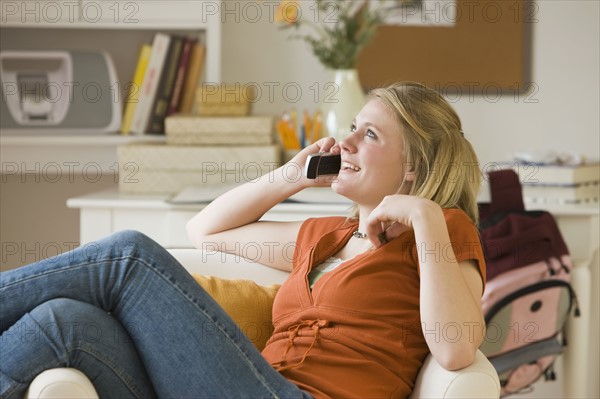 Teenaged girl talking on cell phone.