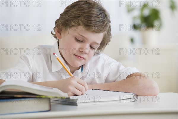 Boy doing homework.
