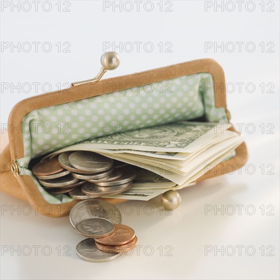 Money in open change purse.