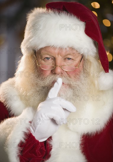 Santa Claus shushing.