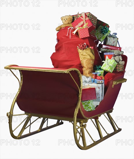 Sleigh with bag of Christmas toys.