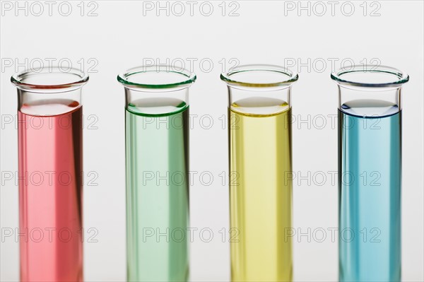 Multi-colored liquids in vials.