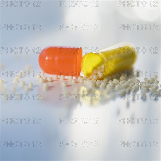 Close up of open medication capsule.