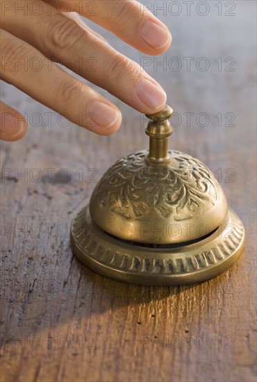 Man ringing service bell.