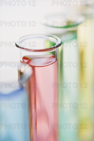 Multi-colored liquids in vials.