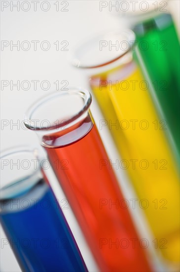 Multi-colored liquids in vials.