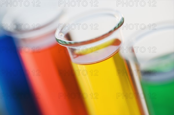 Multi-colored liquids in vials.