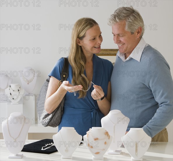 Couple shopping for jewelry.