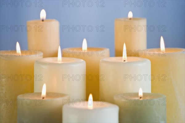 Close up of lit candles.