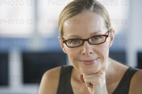 Woman wearing eyeglasses.