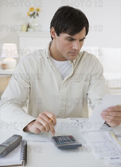 Man preparing taxes.